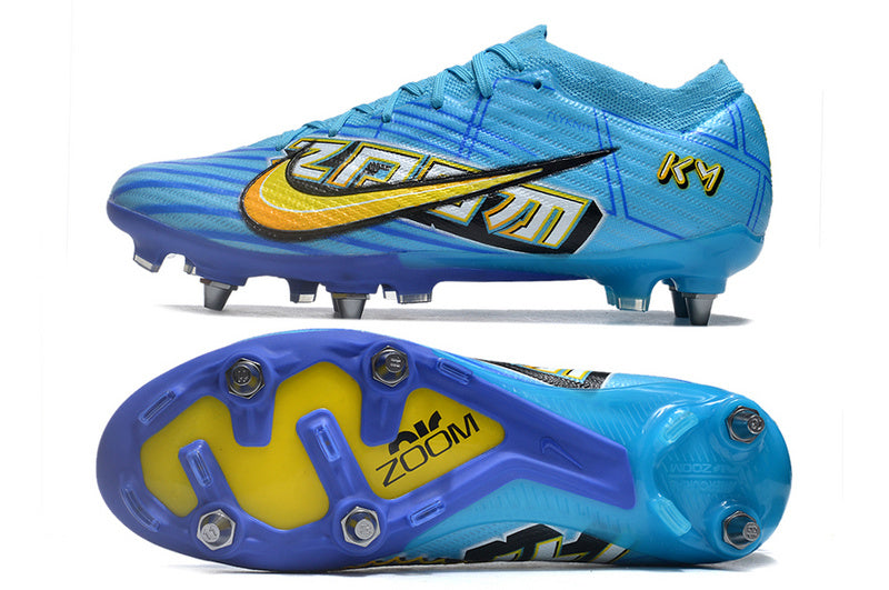 CHUTEIRA NIKE AIR ZOOM MERCURIAL VAPOR 15 ELITE TRAVA MISTA "MBAPPÉ COMIC" - AZUL E AMARELA