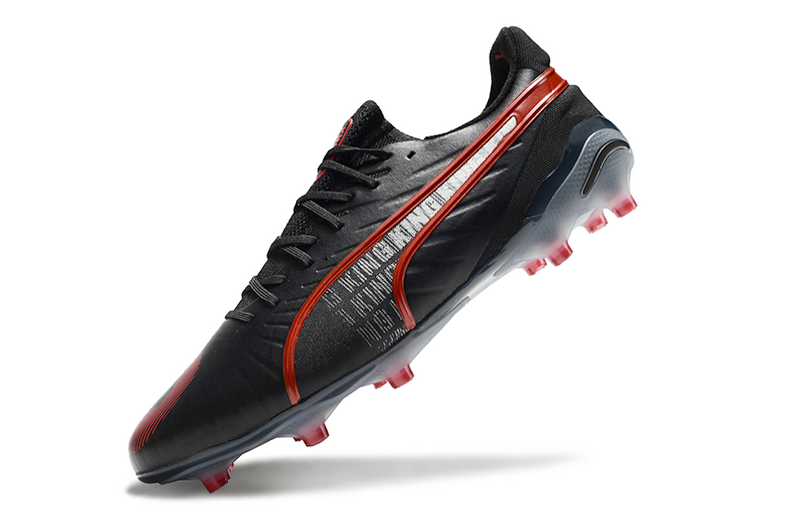 CHUTEIRA PUMA KING FG/AG CAMPO - PRETA E LARANJA