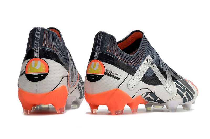 CHUTEIRA PUMA FUTURE ULTIMATE CAMPO "ASTRONAUT" - PRATA E LARANJA