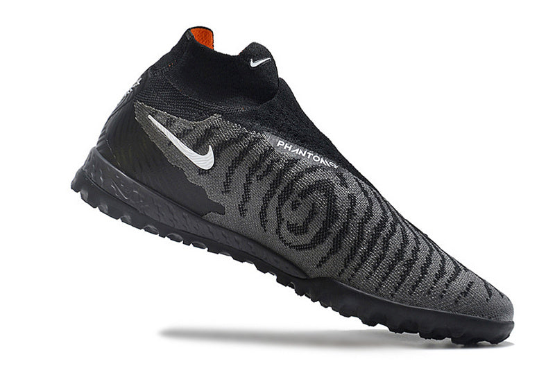 CHUTEIRA NIKE PHANTOM GX DYNAMIC FIT ELITE SOCIETY - CINZA, PRETA E LARANJA