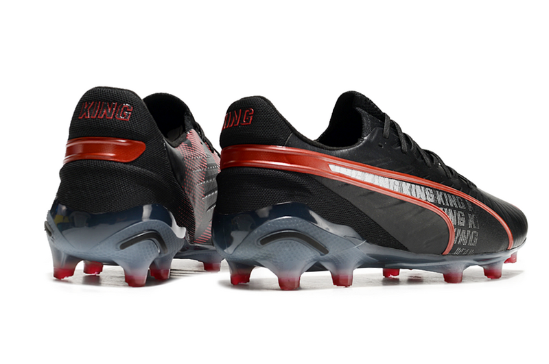 CHUTEIRA PUMA KING FG/AG CAMPO - PRETA E LARANJA